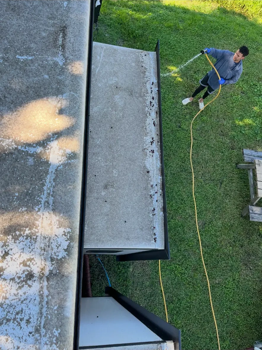 Weathered RV slide-out roof before Van-Van cleaning